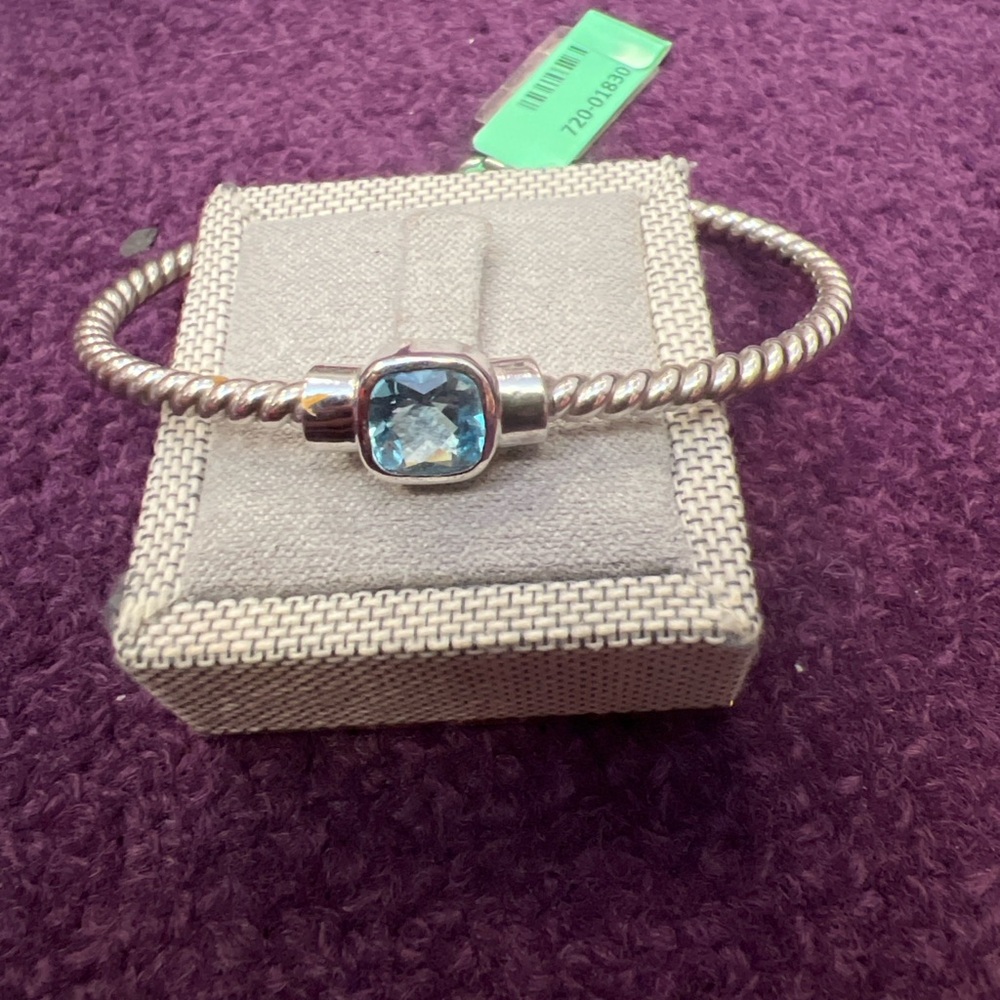 Sterling silver cable twist bangle w/ blue topaz